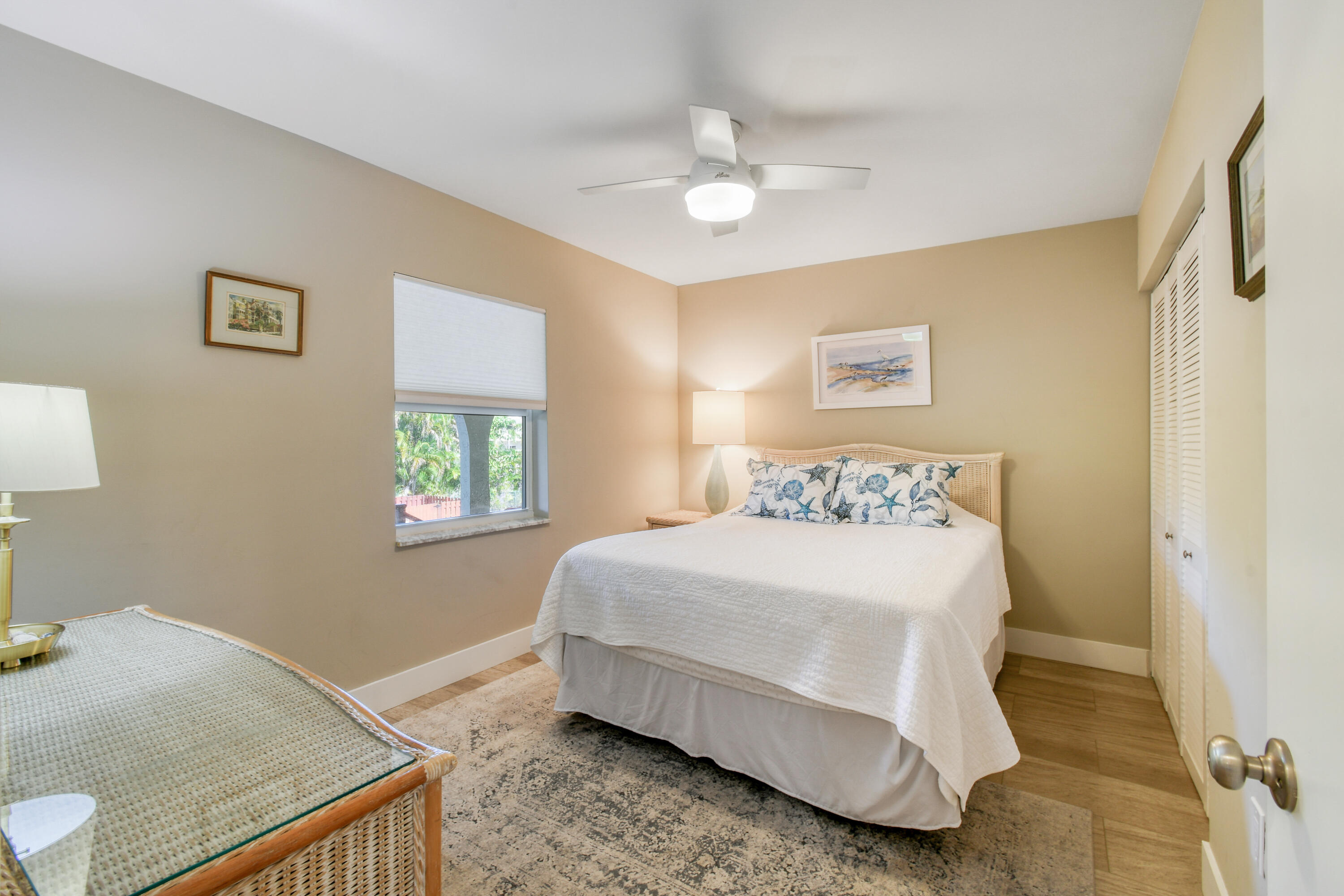 717 Highway 1, Unit 508 Jupiter, FL 33477 - Photo 28 of 66 a bedroom with a bed and a window