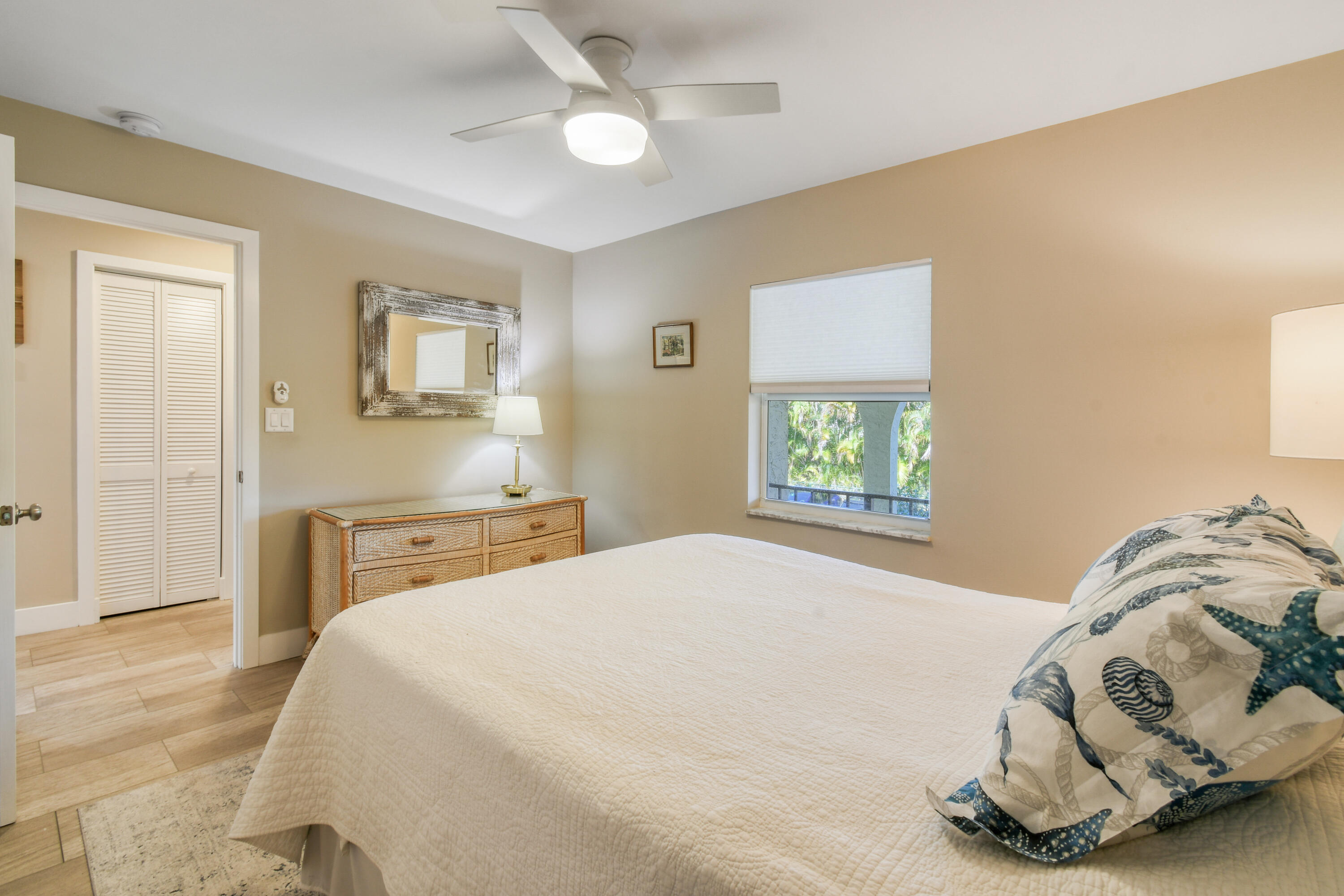 717 Highway 1, Unit 508 Jupiter, FL 33477 - Photo 29 of 66 a bedroom with a bed and a window