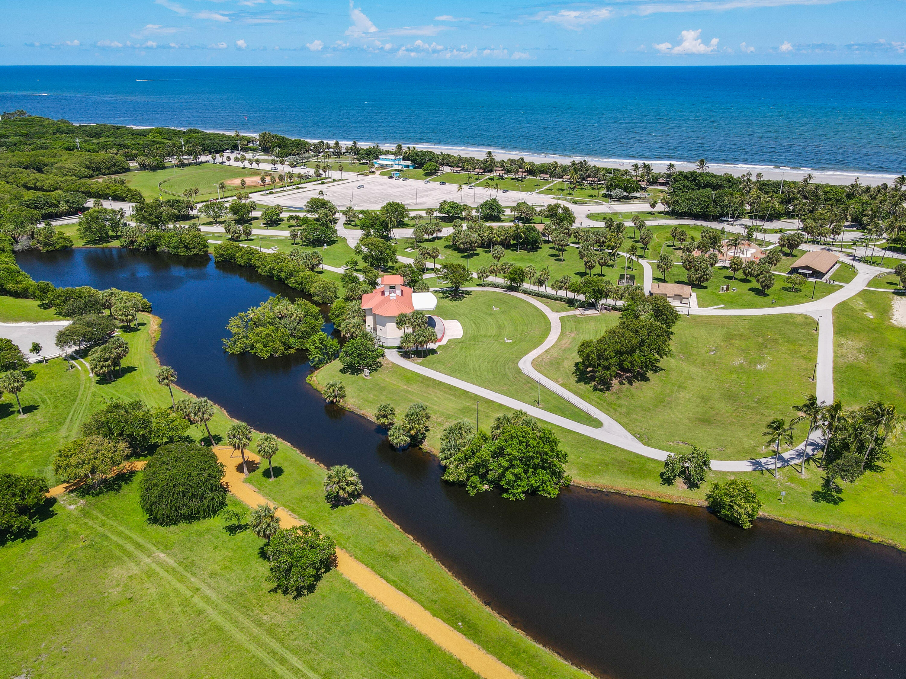 717 Highway 1, Unit 508 Jupiter, FL 33477 - Photo 53 of 66 a view of a lake with a houses