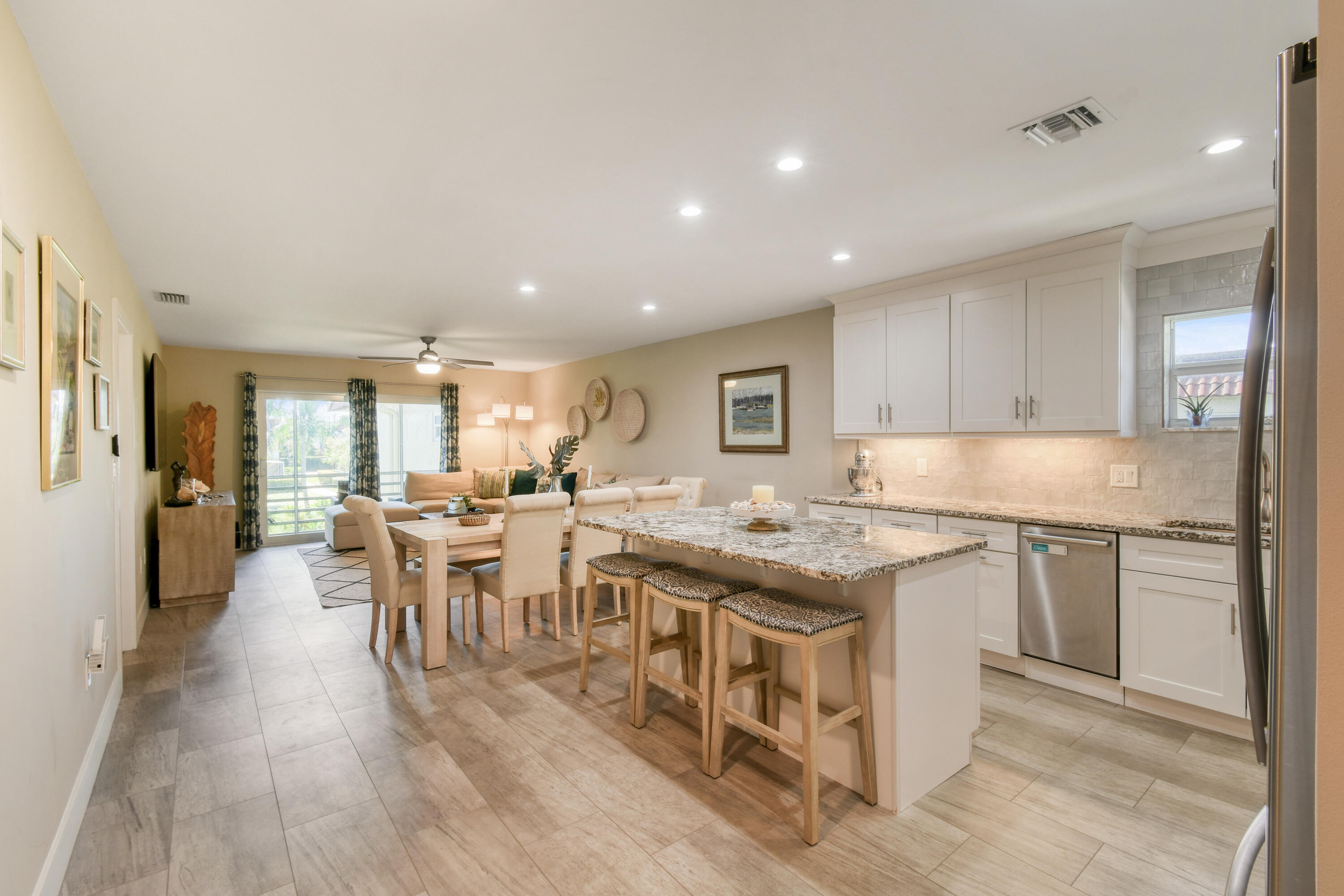 717 Highway 1, Unit 508 Jupiter, FL 33477 - Photo 7 of 66 a kitchen with a table and chairs