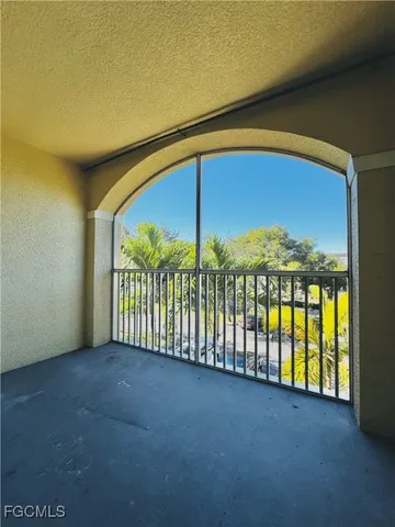 a view of a room with a large window