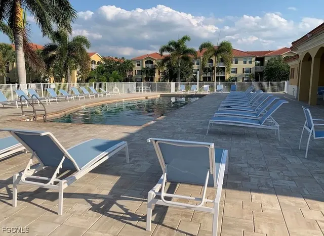 a view of a backyard with a patio