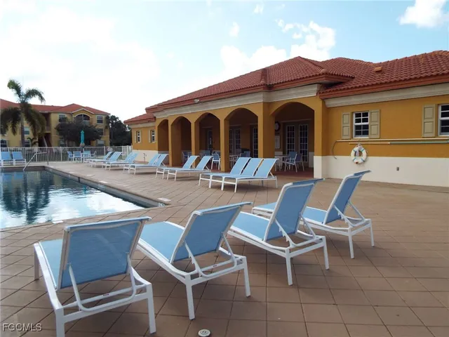 a view of house with outdoor seating space