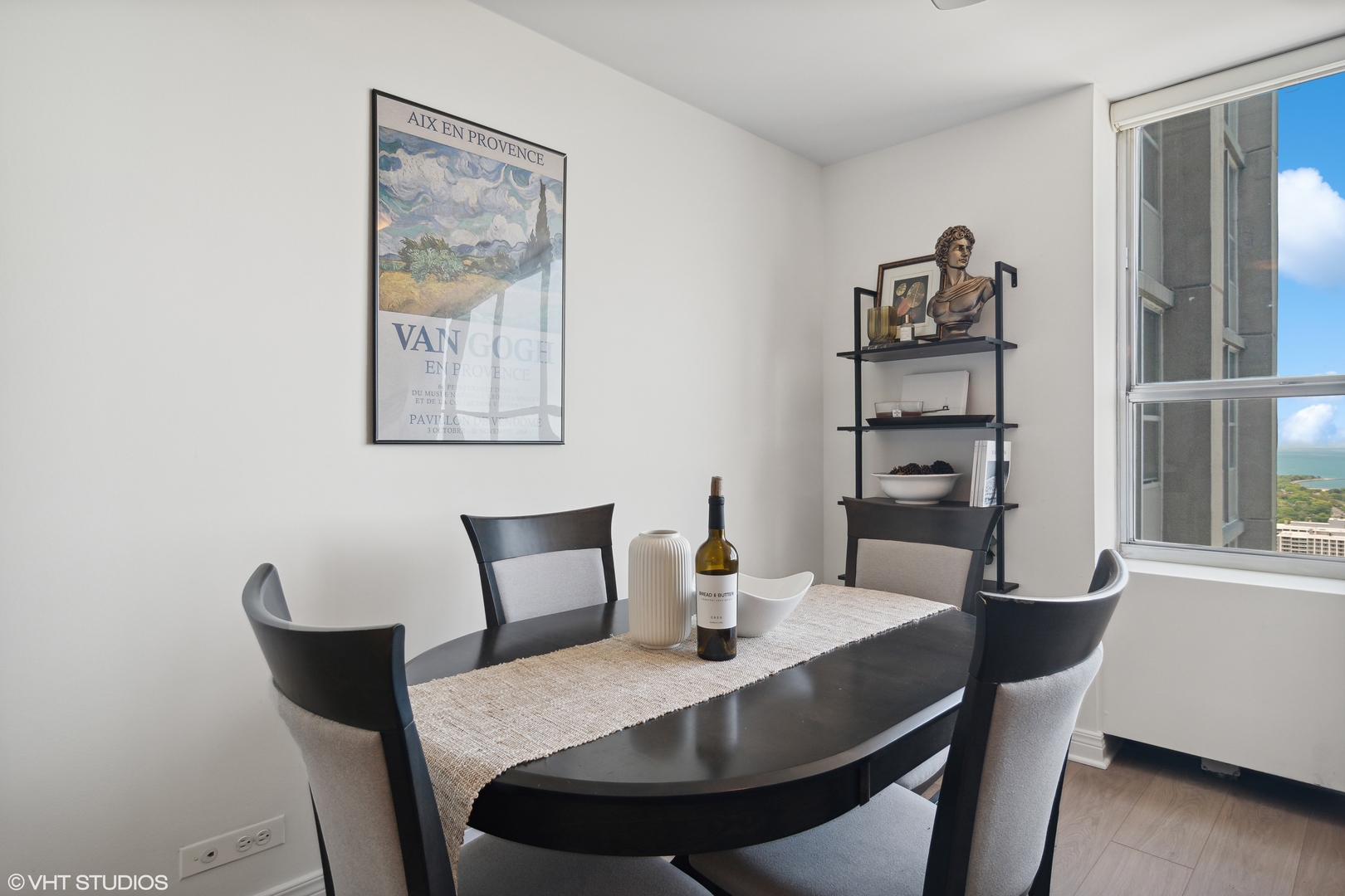655 West Irving Park Road, Unit 5208 Chicago, IL 60613 - Photo 4 of 16 a view of a dining room with furniture and window
