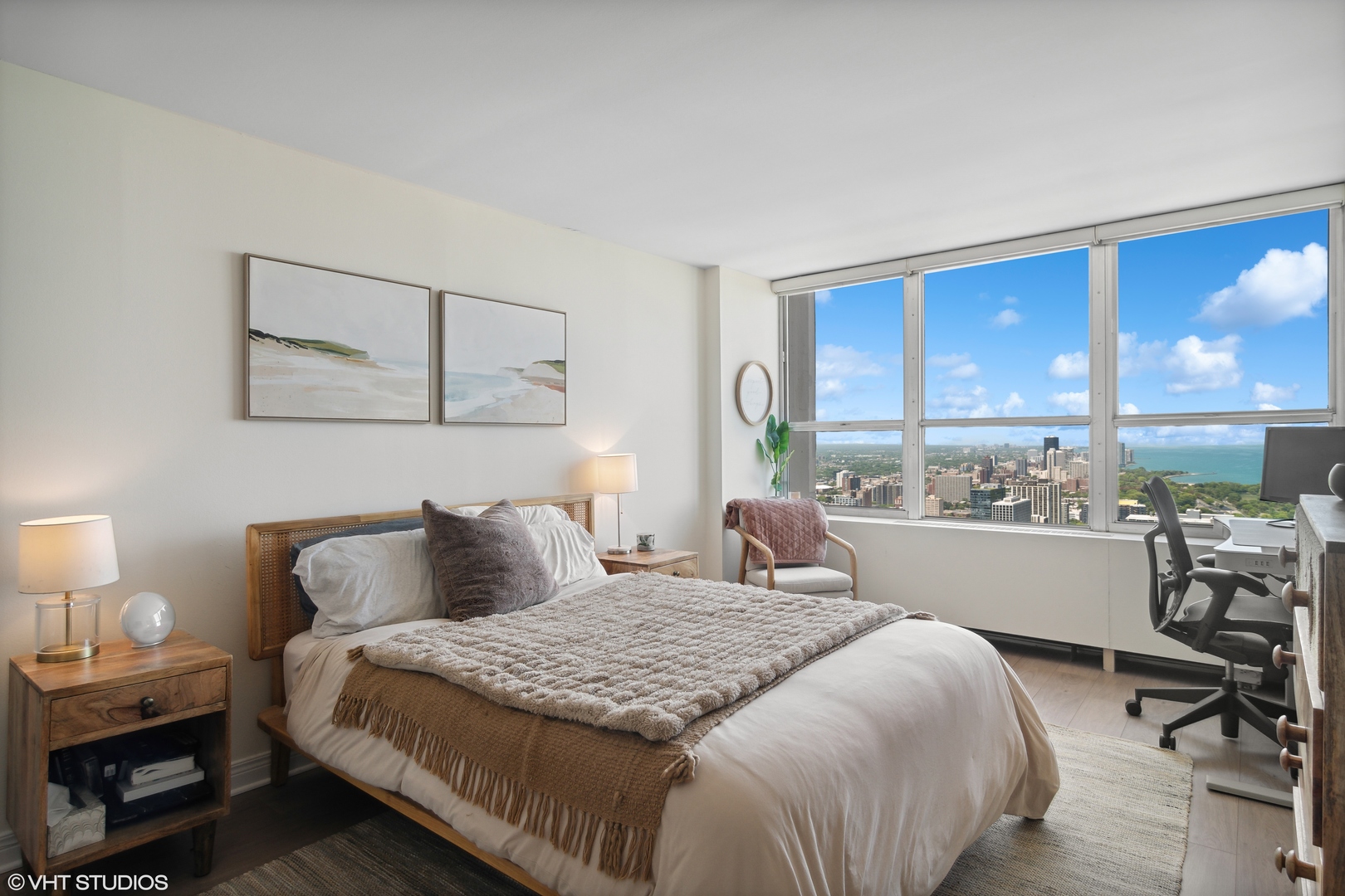655 West Irving Park Road, Unit 5208 Chicago, IL 60613 - Photo 7 of 16 a bedroom with a bed and window