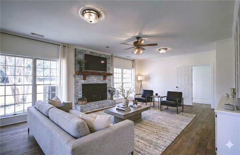 142 Carr Road LaGrange, GA 30241 - Photo 26 of 109 a living room with furniture and a fireplace