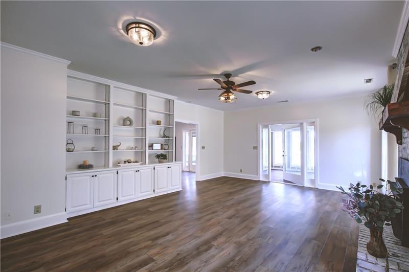 142 Carr Road LaGrange, GA 30241 - Photo 28 of 109 a view of an empty room with a window and wooden floor