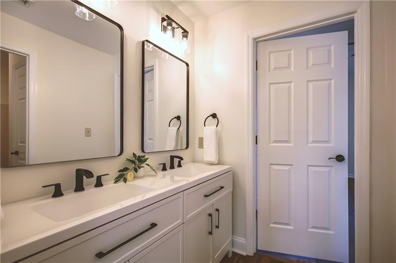 142 Carr Road LaGrange, GA 30241 - Photo 56 of 109 a bathroom with a sink and a mirror