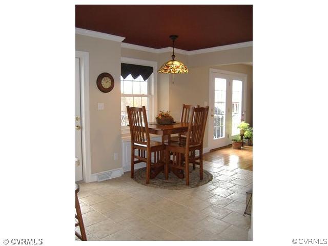 1752 Chinquapin Road Prospect, VA 23960 - Photo 11 of 16 a view of a dining room with furniture and window
