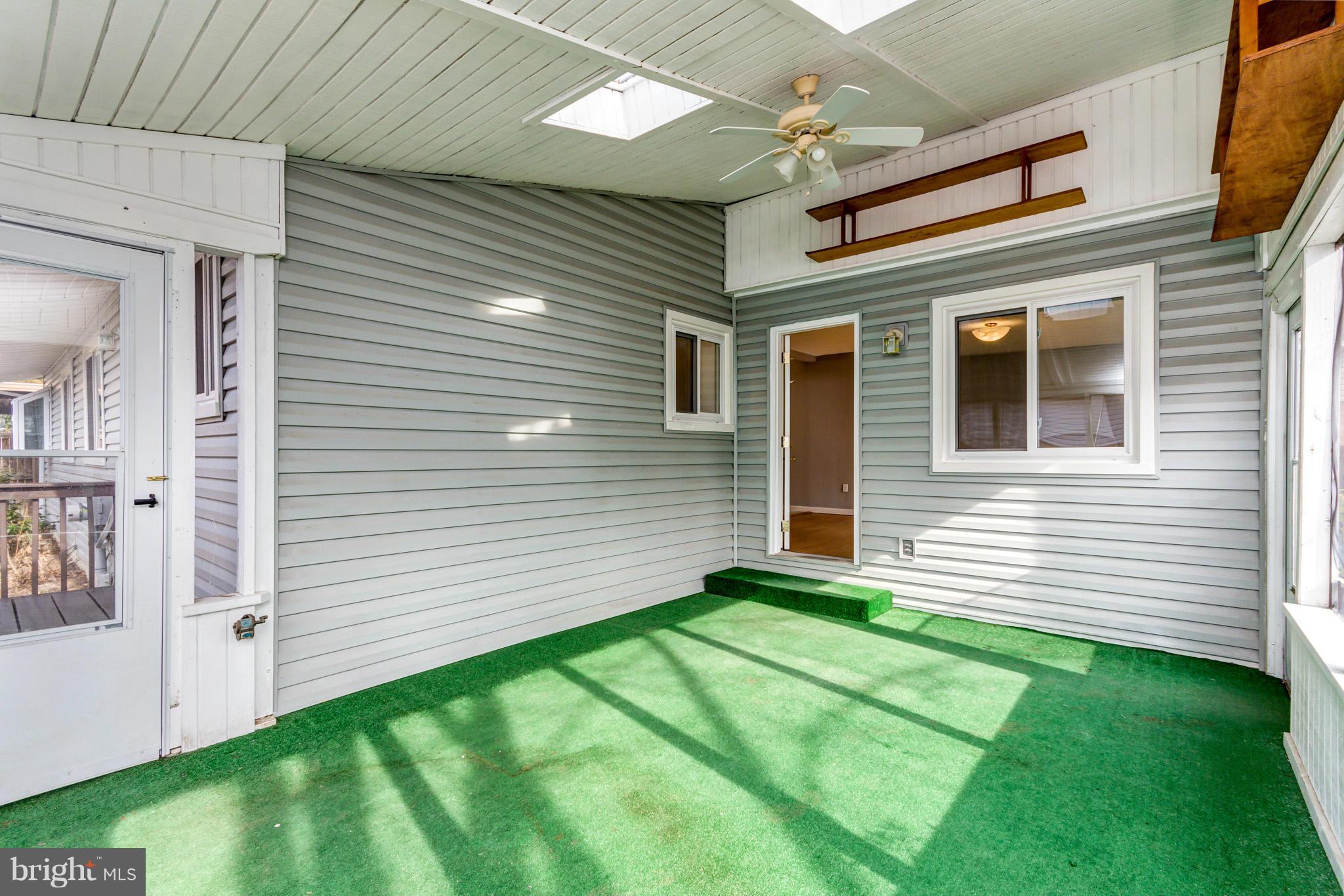 617 Barton Road Edgewater, MD 21037 - Photo 14 of 30 a view of a house with a backyard