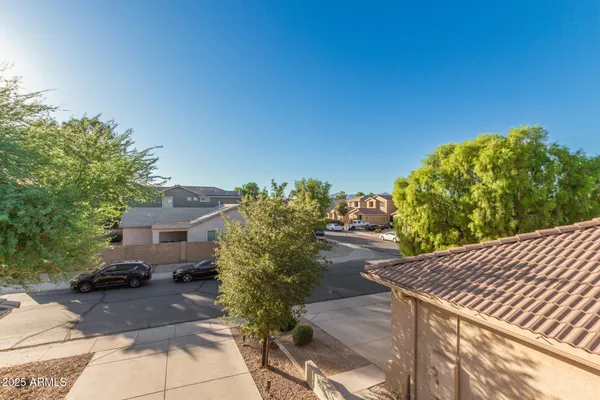 a front view of a house with a yard and porch