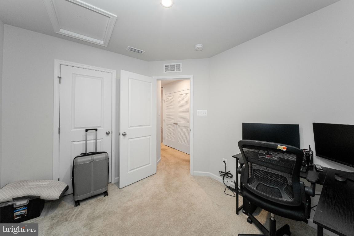18256 Capital Court Ruther Glen, VA 22546 - Photo 22 of 26 a view of a livingroom with furniture and a flat screen tv