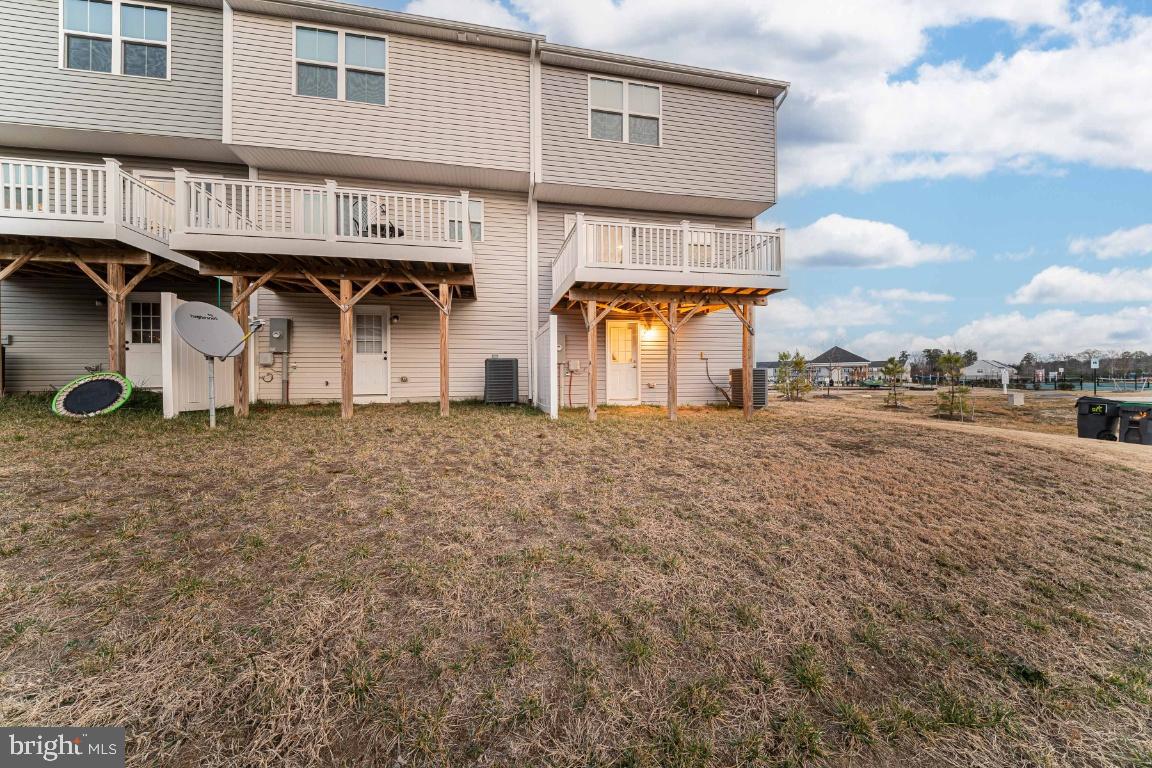 18256 Capital Court Ruther Glen, VA 22546 - Photo 26 of 26 a front view of a house with a yard