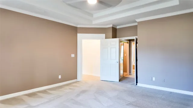 an aerial view of residential house with outdoor space and trees all around
