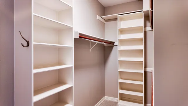 an aerial view of house with yard and swimming pool