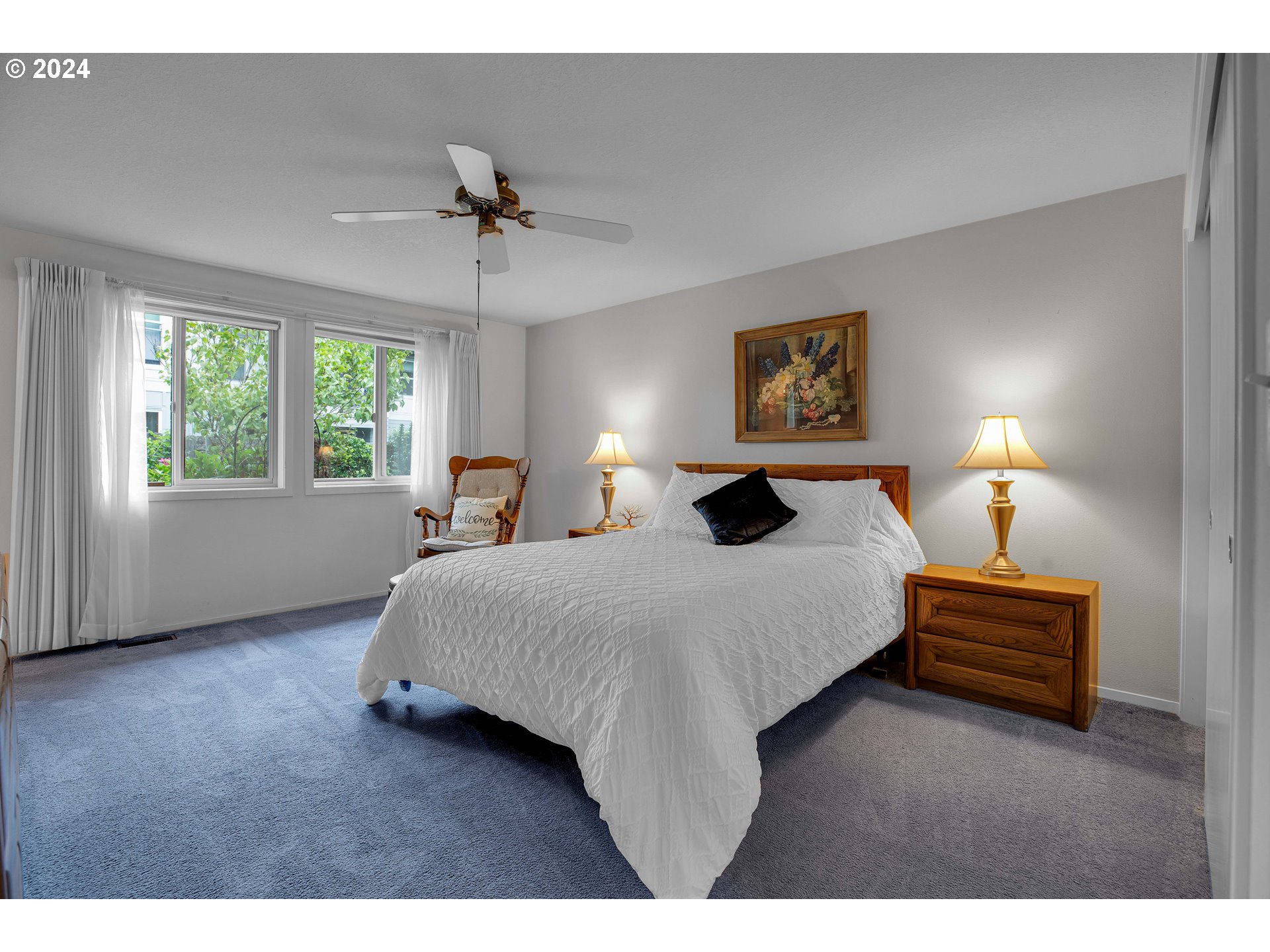 1580 Northwest 175th Place Beaverton, OR 97006 - Photo 14 of 28 a bedroom with bed and window