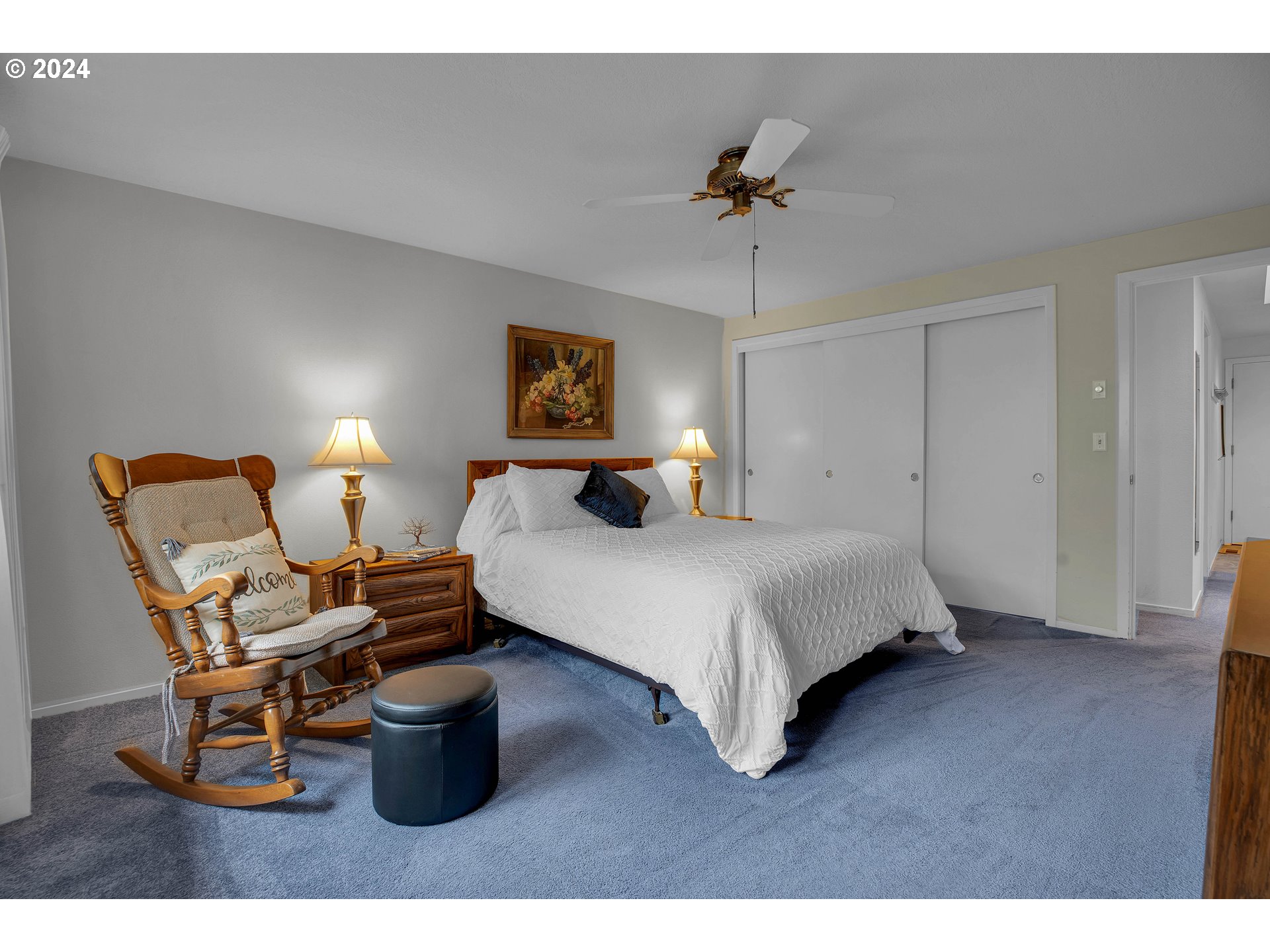 1580 Northwest 175th Place Beaverton, OR 97006 - Photo 15 of 28 a bedroom with a bed and wooden floor