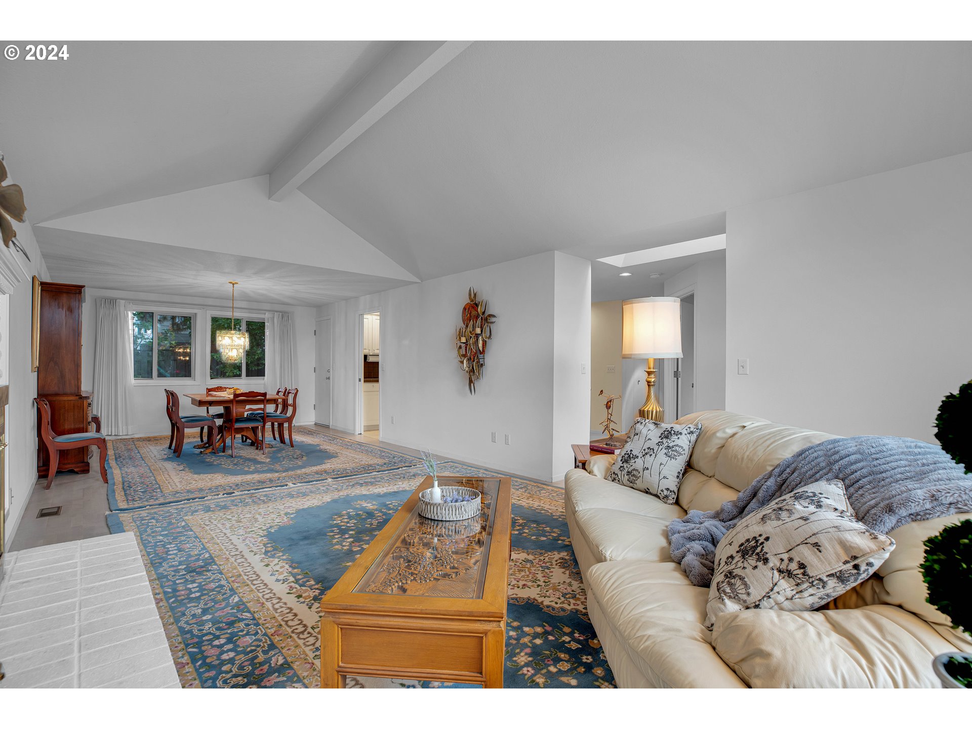 1580 Northwest 175th Place Beaverton, OR 97006 - Photo 6 of 28 a living room with furniture and wooden floor