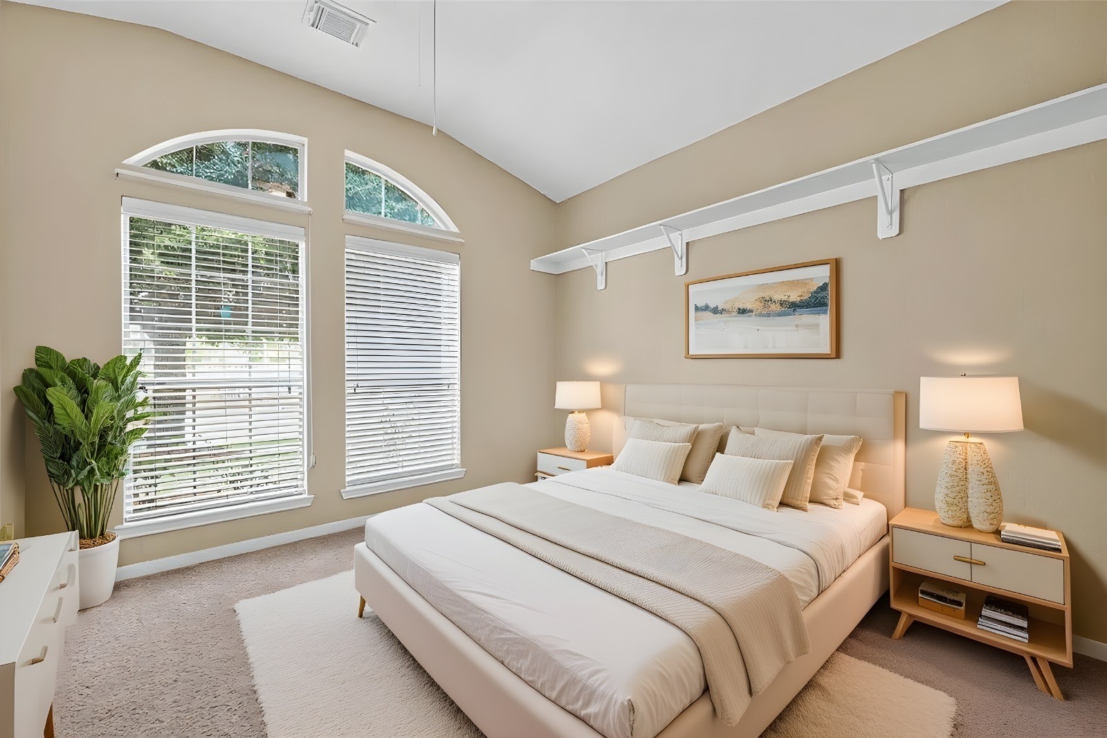 215 Little Summer Drive Rosenberg, TX 77469 - Photo 5 of 16 a bedroom with a large bed and a large window