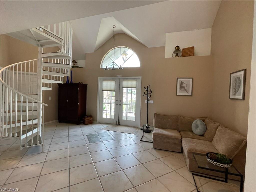 405 Cristobal Street Naples, FL 34113 - Photo 13 of 24 a living room with furniture and a window