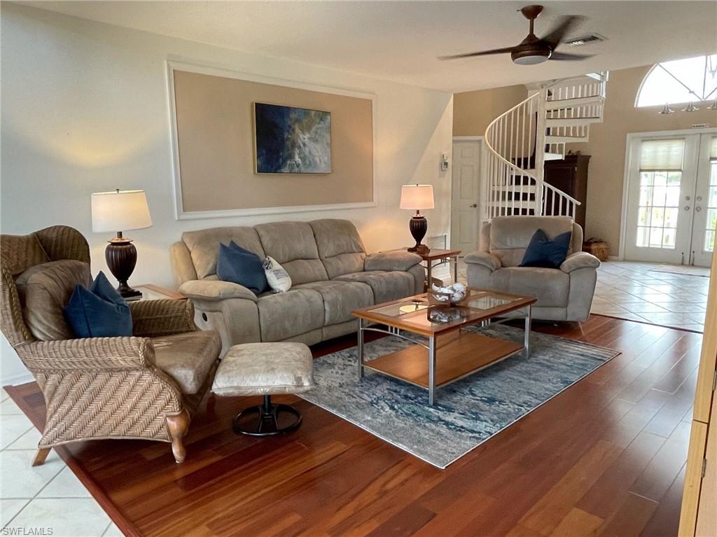 405 Cristobal Street Naples, FL 34113 - Photo 14 of 24 a living room with furniture and a rug