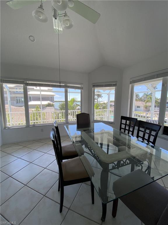 405 Cristobal Street Naples, FL 34113 - Photo 17 of 24 a living room with furniture and a large window