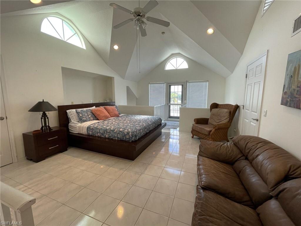 405 Cristobal Street Naples, FL 34113 - Photo 20 of 24 a living room with furniture and a mirror