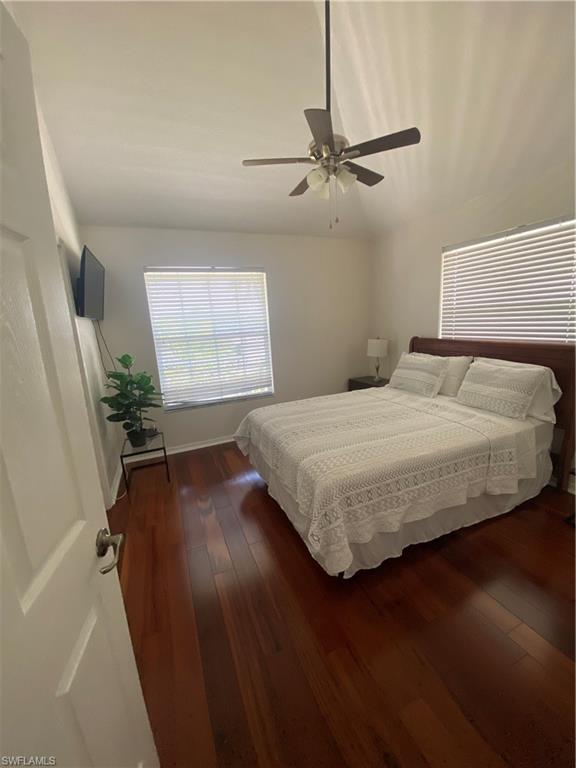 405 Cristobal Street Naples, FL 34113 - Photo 23 of 24 a bedroom with a bed and window