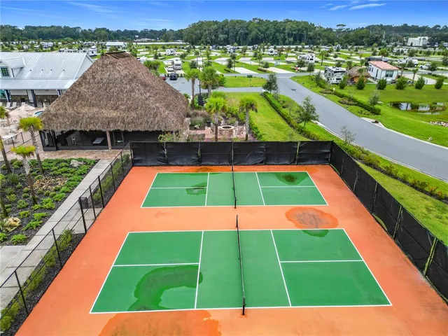 a view of an outdoor space pool patio and ocean view