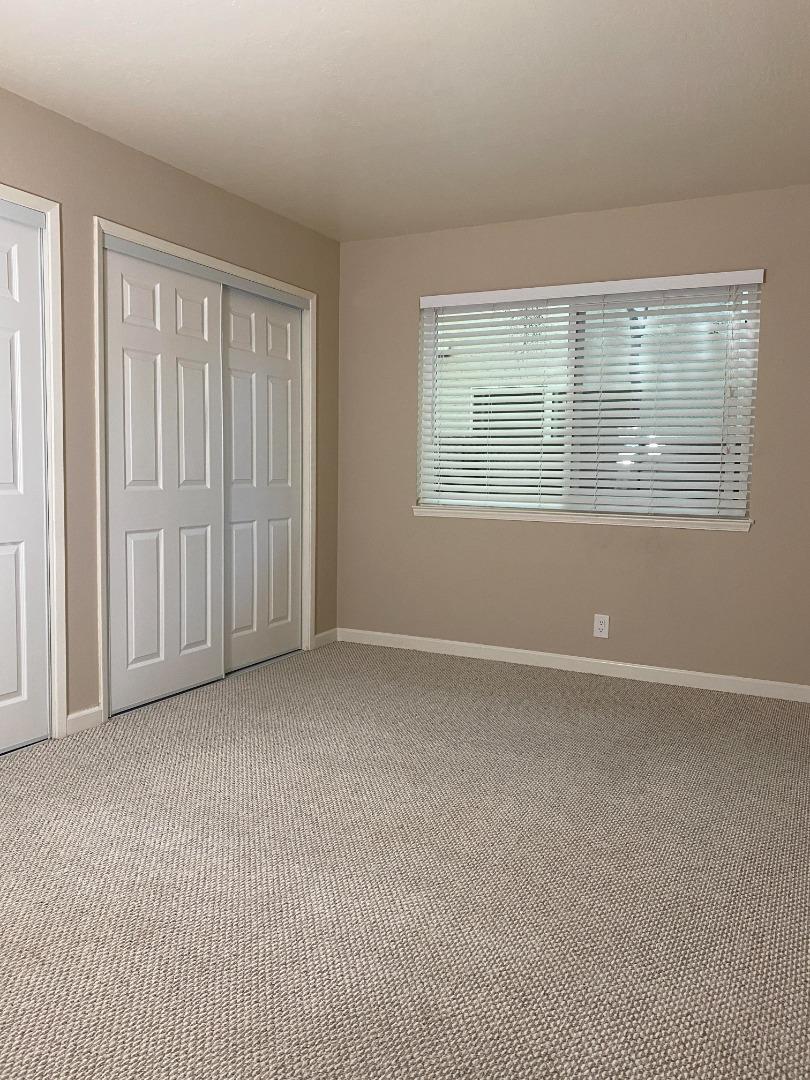 1242 Cortez Drive Sunnyvale, CA 94086 - Photo 12 of 31 an empty room with windows
