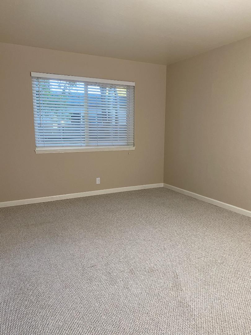 1242 Cortez Drive Sunnyvale, CA 94086 - Photo 13 of 31 an empty room with windows