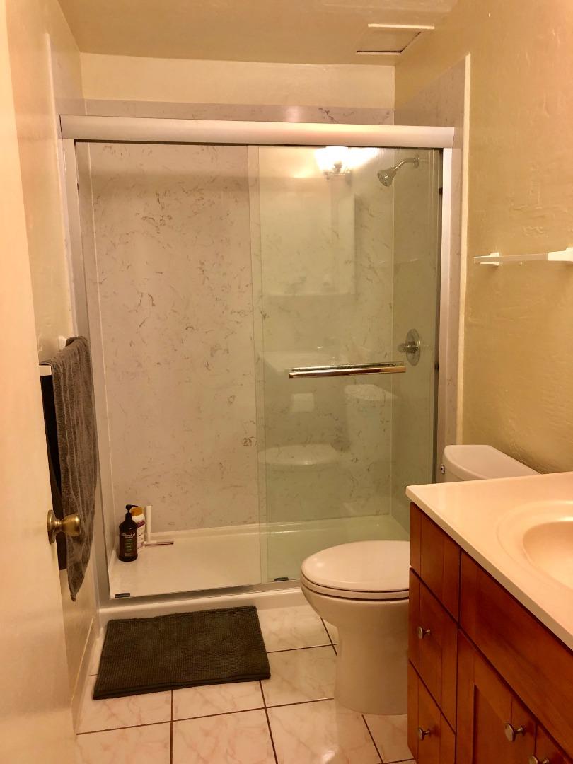 1242 Cortez Drive Sunnyvale, CA 94086 - Photo 16 of 31 a bathroom with a sink a toilet and shower