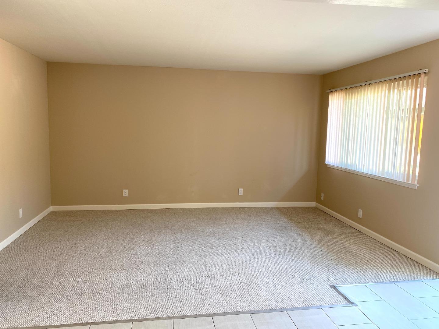 1242 Cortez Drive Sunnyvale, CA 94086 - Photo 21 of 31 an empty room with windows