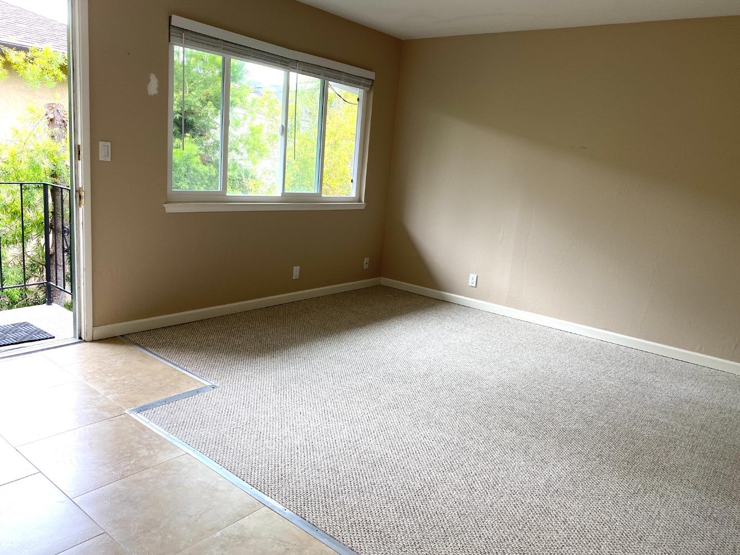 1242 Cortez Drive Sunnyvale, CA 94086 - Photo 26 of 31 an empty room with windows
