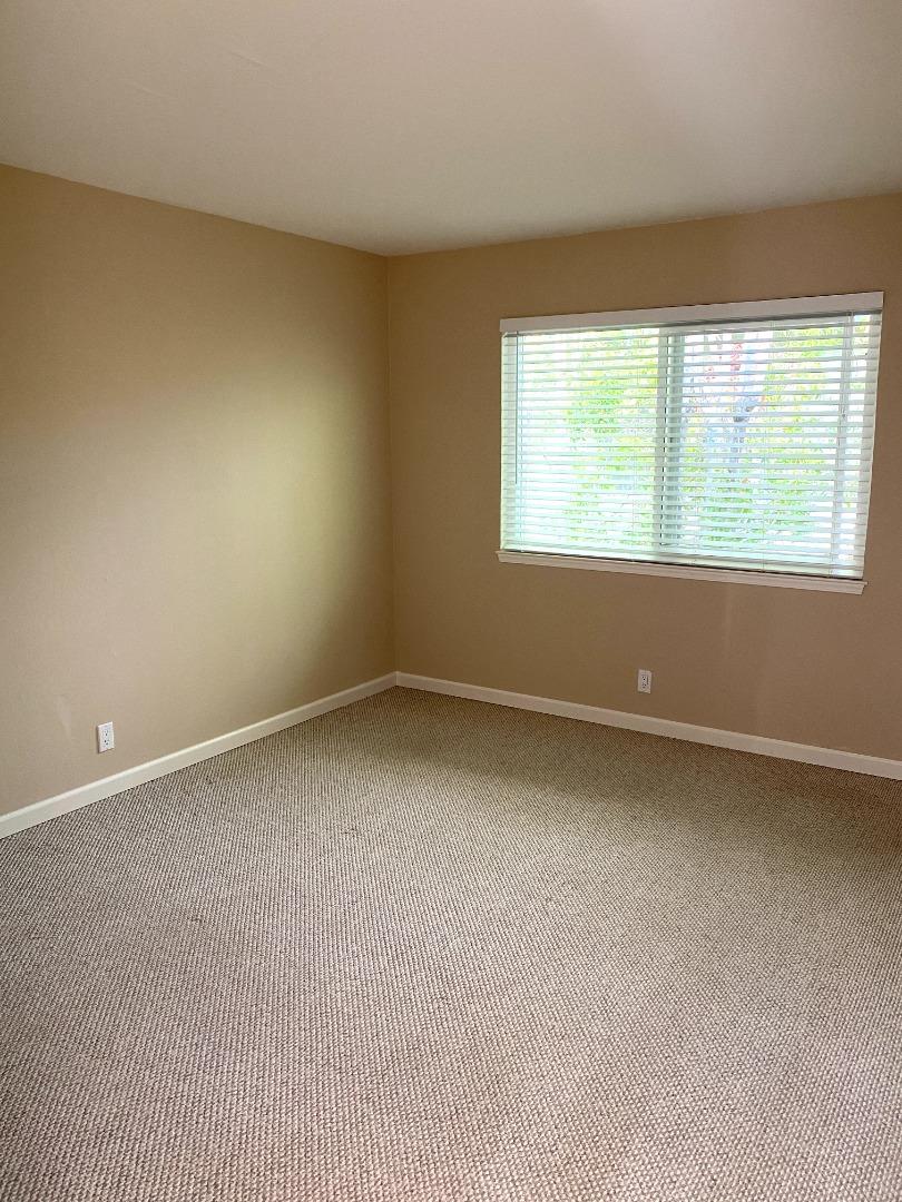 1242 Cortez Drive Sunnyvale, CA 94086 - Photo 29 of 31 an empty room with a window