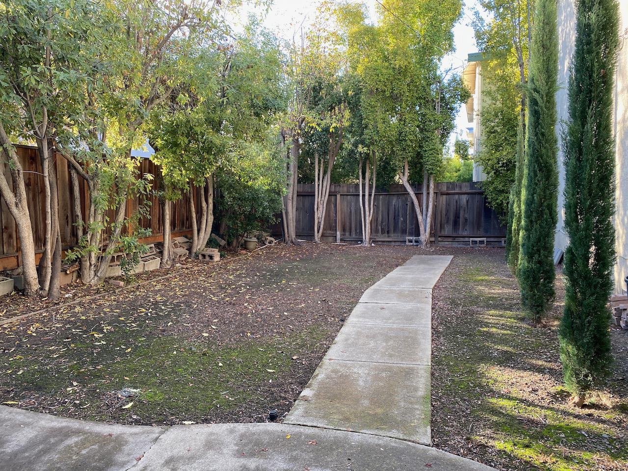 1242 Cortez Drive Sunnyvale, CA 94086 - Photo 6 of 31 a backyard of a house with lots of green space