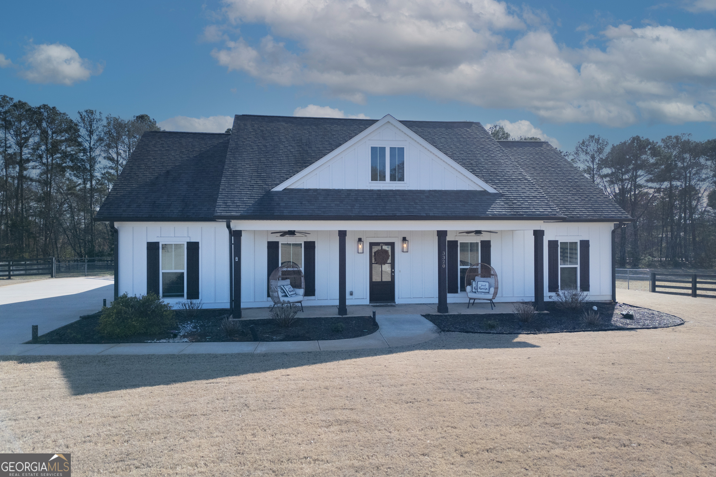 3320 Davis Academy Road Rutledge, GA 30663 - Photo 12 of 45 a front view of a house with a yard