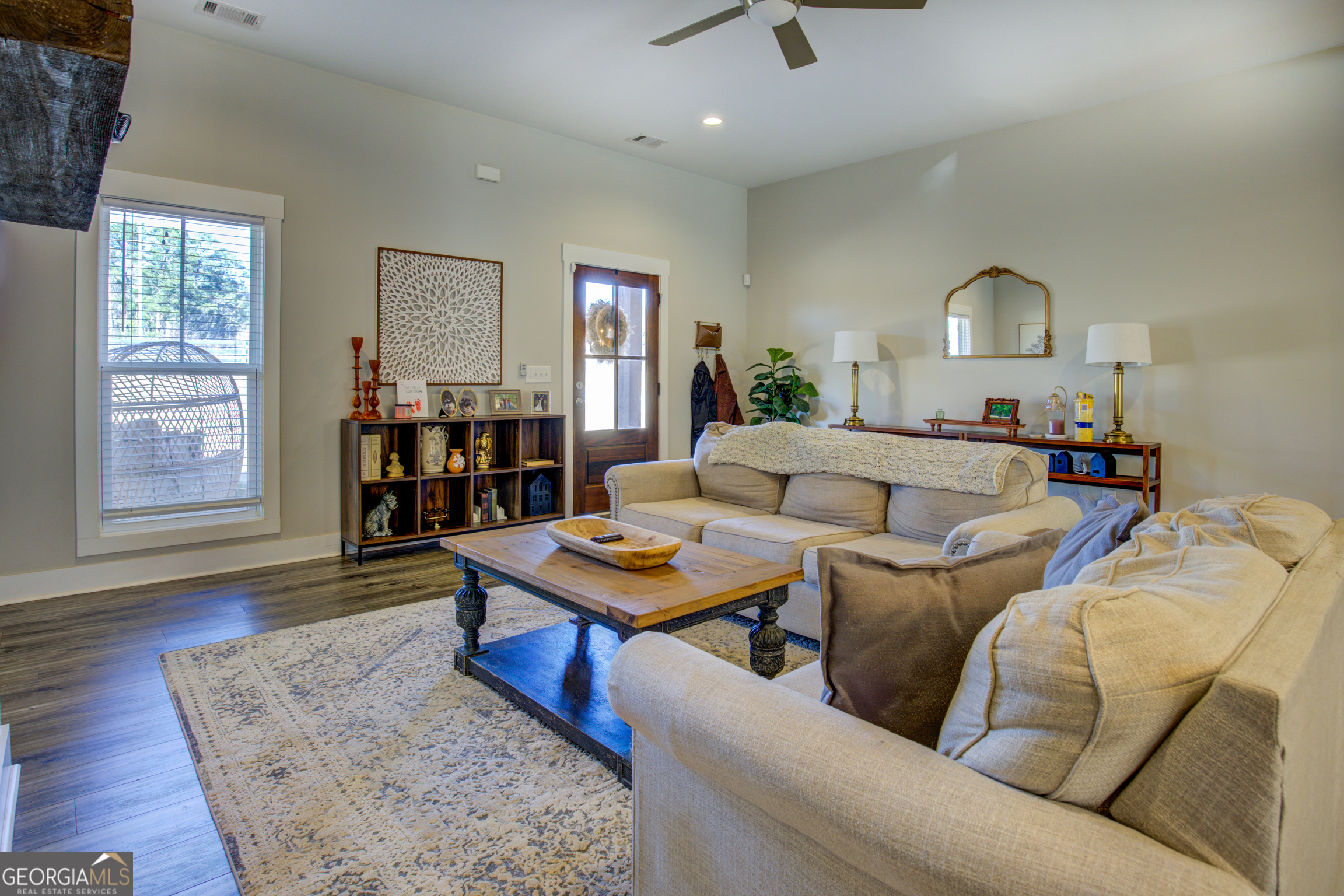 3320 Davis Academy Road Rutledge, GA 30663 - Photo 15 of 45 a living room with furniture and a window
