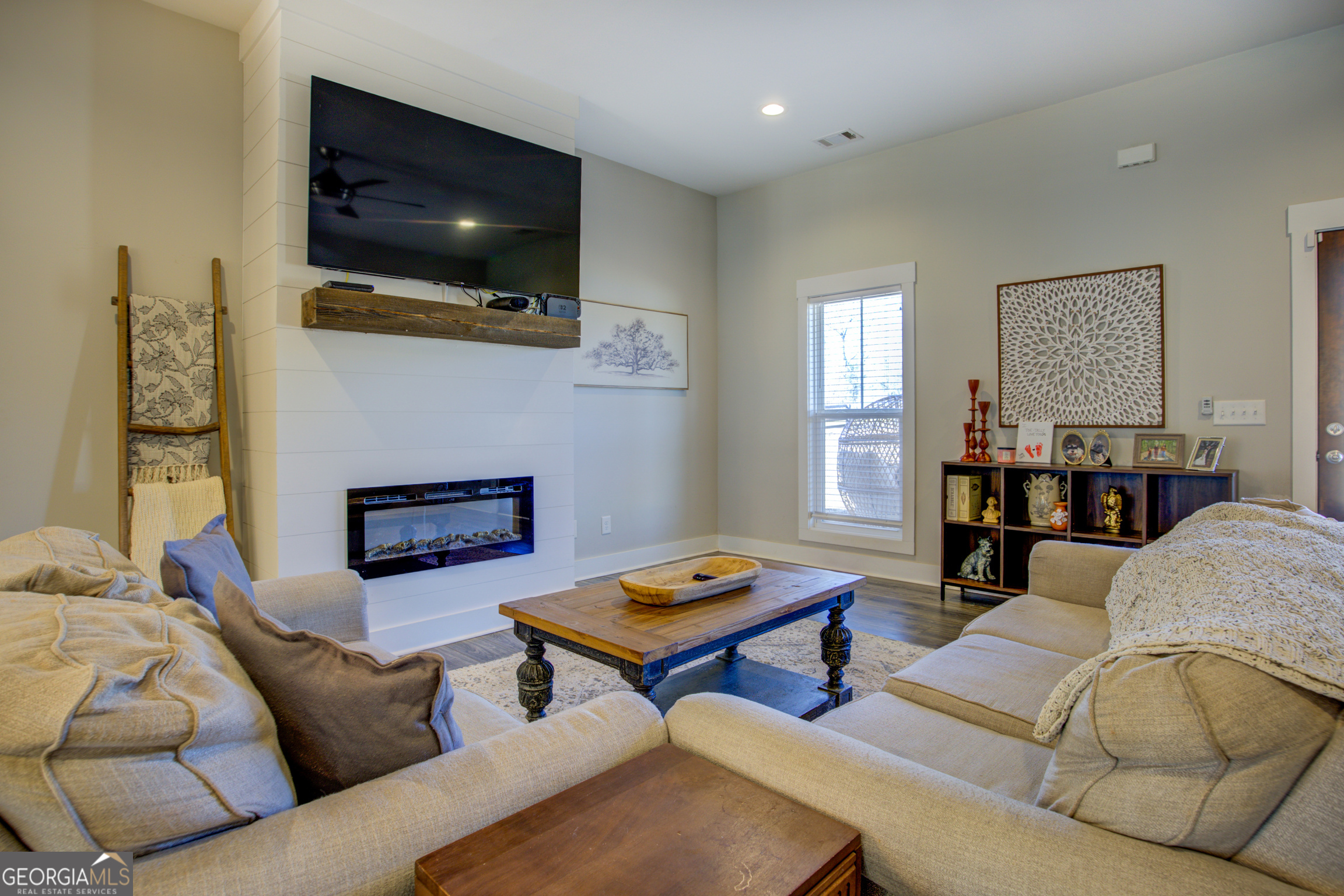 3320 Davis Academy Road Rutledge, GA 30663 - Photo 19 of 45 a living room with furniture and a flat screen tv