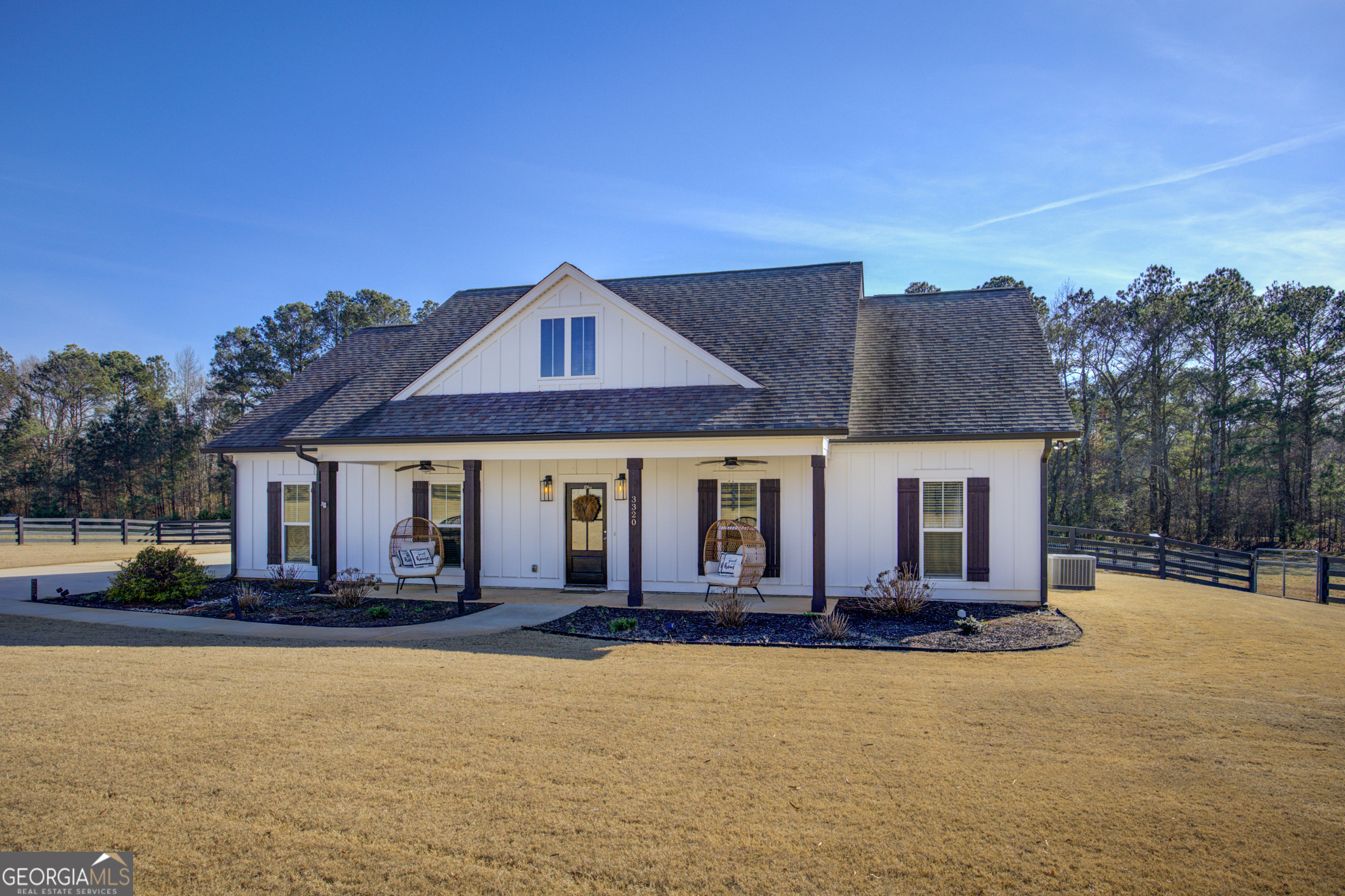 3320 Davis Academy Road Rutledge, GA 30663 - Photo 3 of 45 a front view of a house with a yard