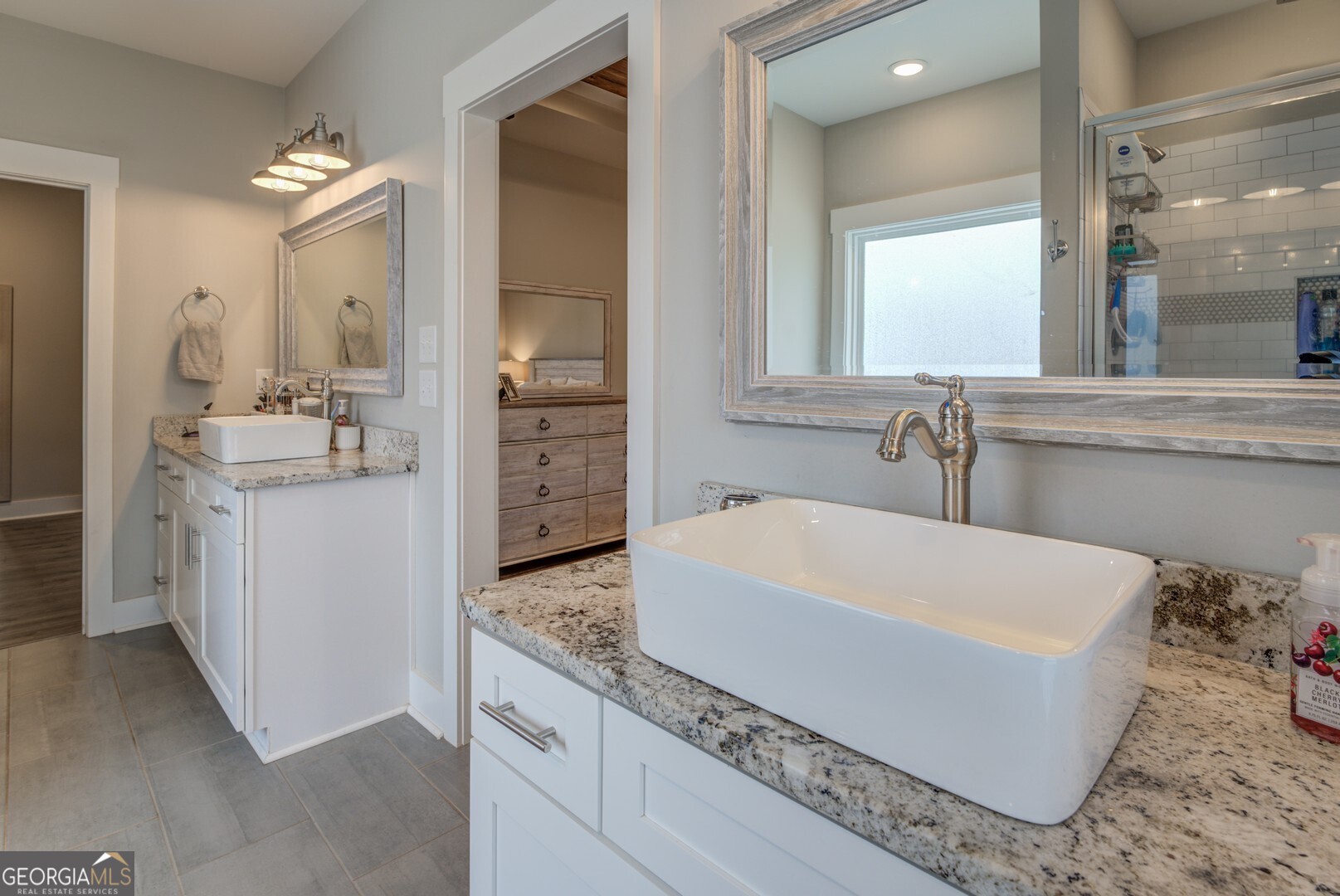 3320 Davis Academy Road Rutledge, GA 30663 - Photo 32 of 45 a spacious bathroom with a tub sink and mirror