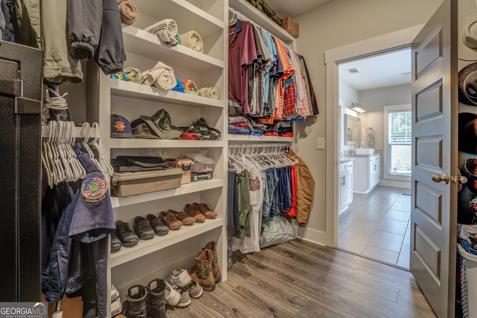 3320 Davis Academy Road Rutledge, GA 30663 - Photo 33 of 45 a view of walk in closet with clothes and shoes