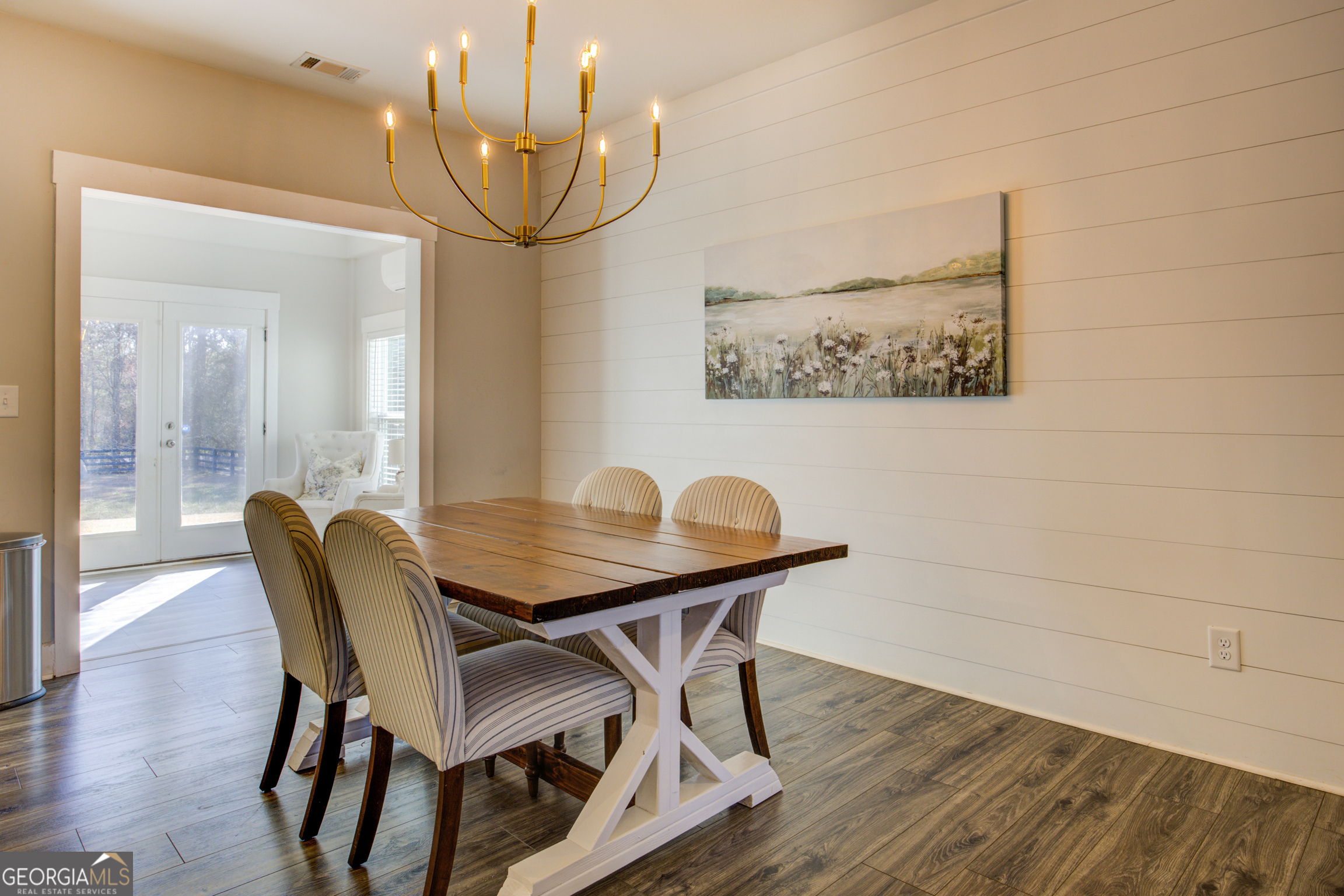 3320 Davis Academy Road Rutledge, GA 30663 - Photo 34 of 45 a view of a dining room with furniture and wooden floor