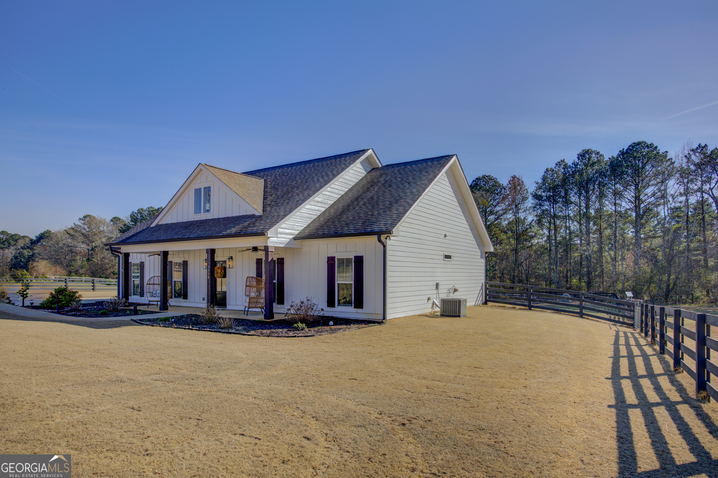 3320 Davis Academy Road Rutledge, GA 30663 - Photo 4 of 45 a view of house with yard and entertaining space