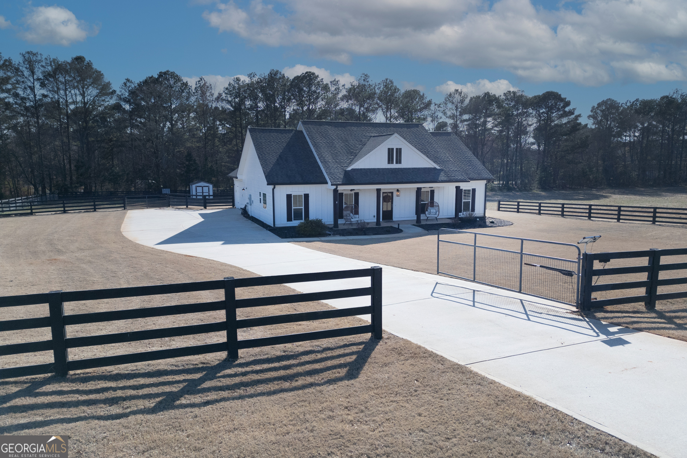 3320 Davis Academy Road Rutledge, GA 30663 - Photo 5 of 45 a view of a house with wooden floor and a yard