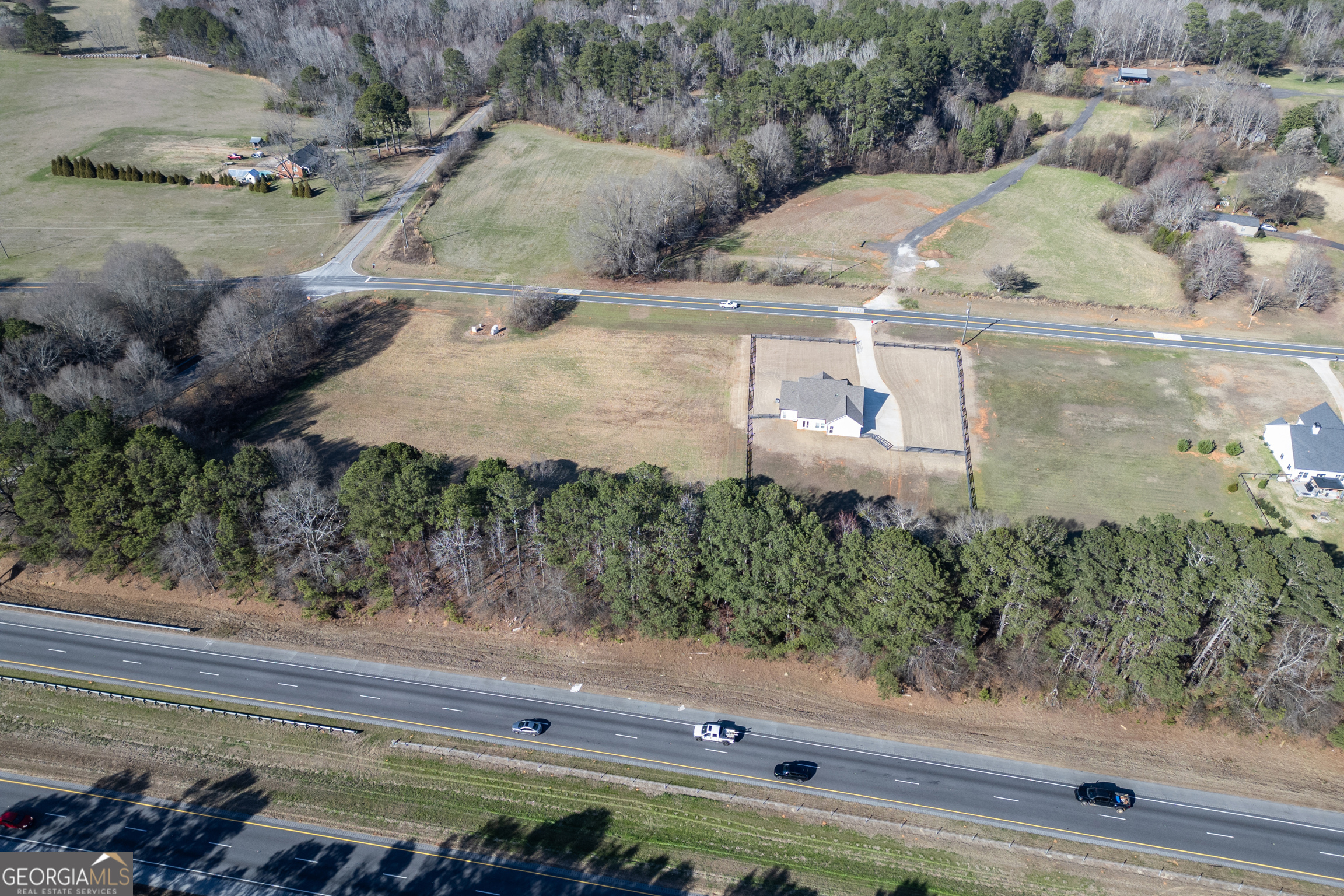 3320 Davis Academy Road Rutledge, GA 30663 - Photo 7 of 45 a view of a yard with an outdoor space