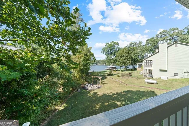 a view of a yard with an outdoor space