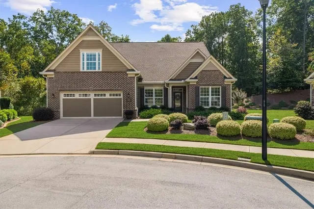 a view of hallway with wooden floor