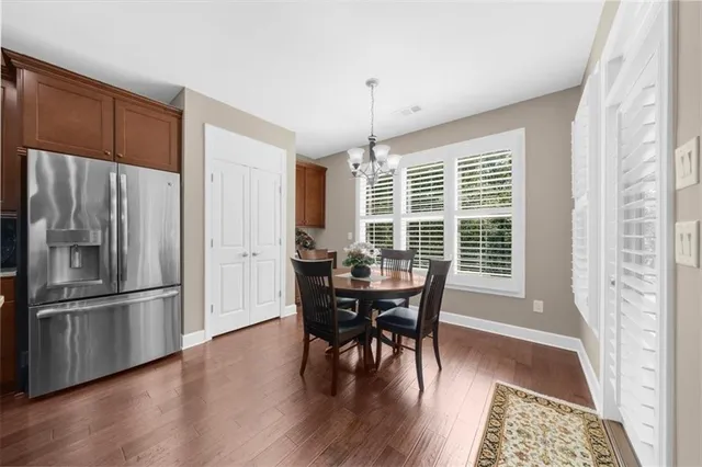 a bathroom with a shower and a sink