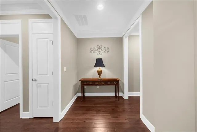 a front view of a house with a garden and porch